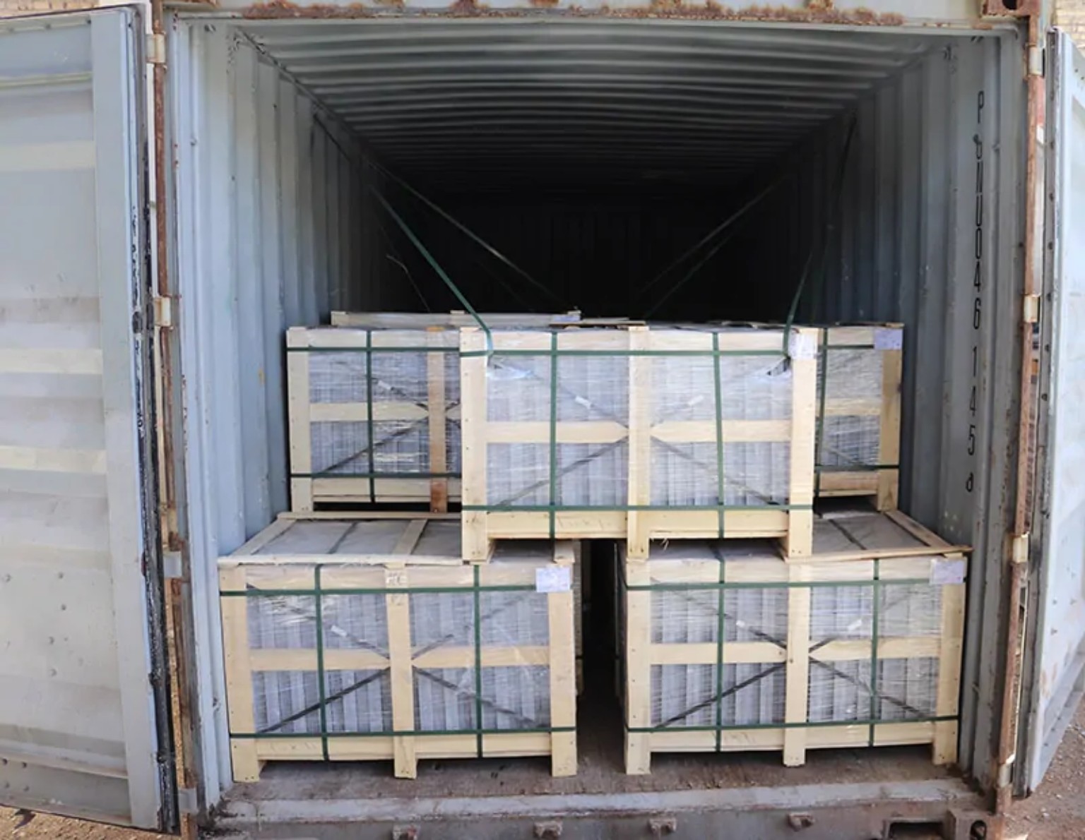 Container-ready export packing and cargo restraint Export crates secured and prepared for container shipment