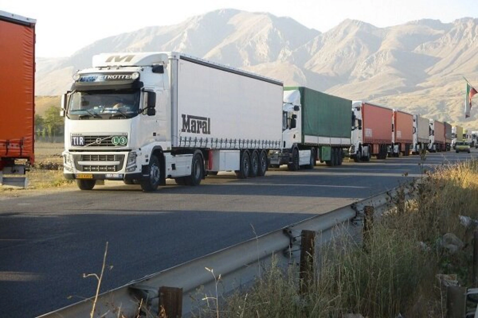 Road freight and international transit from Iran International trucks moving through an Iranian road transit corridor